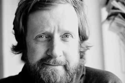 Close-up portrait of woman at home