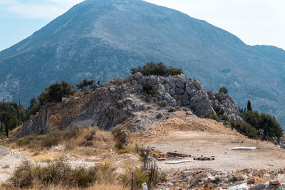 Scenic view of landscape and mountains against sky