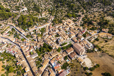 High angle view of street amidst buildings in town