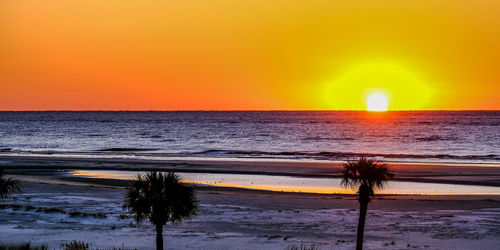 Scenic view of beach during sunset