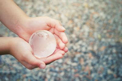 Close-up of woman holding hands