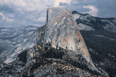 Scenic view of yosemite half dome snowcapped mountains against sky