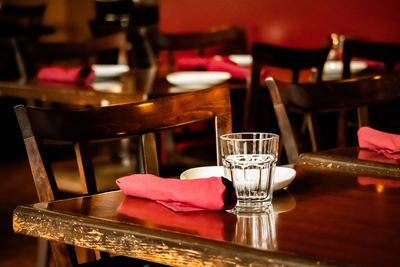 Close-up of empty chairs and table in restaurant