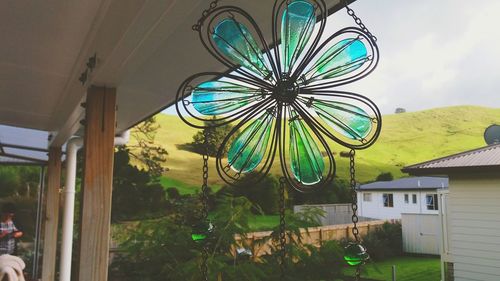 Multi colored balloons against sky