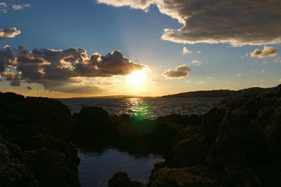 Scenic view of sea against sky during sunset