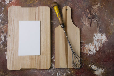 High angle view of tools on wood