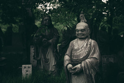 Buddha statue in cemetery