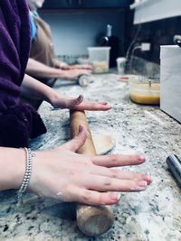 Midsection of woman preparing food