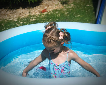 Full length of girl in swimming pool