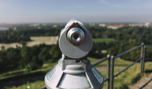 Close-up of coin-operated binoculars at observation point