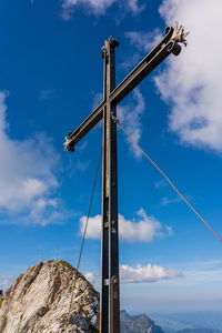 Summit cross on the pilatus mountain massif near lucerne in switzerland.