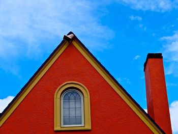 Low angle view of built structure against blue sky