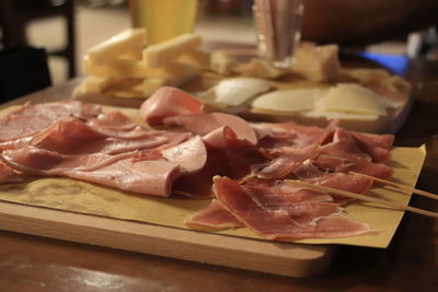 Close-up of meat on cutting board