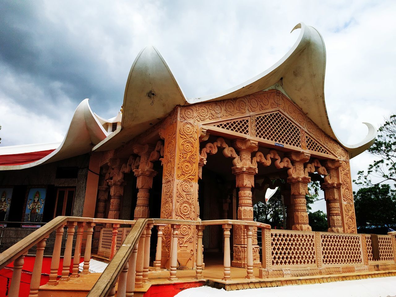 LOW ANGLE VIEW OF TEMPLE AGAINST SKY