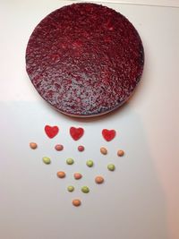 High angle view of multi colored candies on table