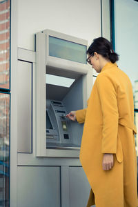 Side view of a young woman looking away