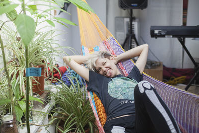 Young woman hanging out in her apartment