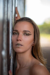 Close-up portrait of young woman