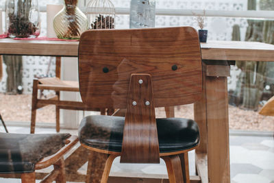 Empty chairs and table in restaurant