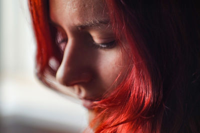 Close-up portrait of a serious young woman