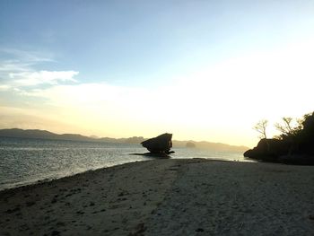 Scenic view of sea at sunset