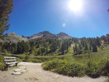 Scenic view of mountains against clear blue sky