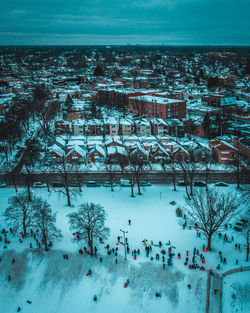 High angle view of city buildings during winter