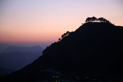 Scenic view of mountains at sunset