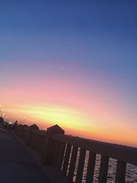 Scenic view of beach against sky during sunset