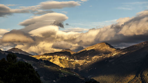 Scenic view of snowcapped mountains against sky