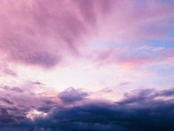 Low angle view of dramatic sky during sunset