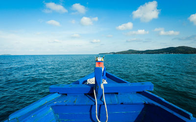 Scenic view of sea against blue sky