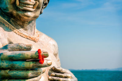 Close-up of statue against sky