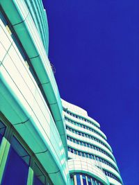 Low angle view of building against blue sky