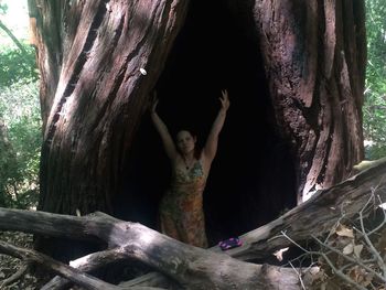 Midsection of man on tree