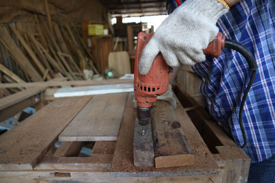 Man working on wood