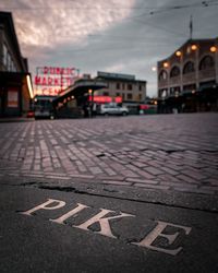 Surface level of road sign on street in city