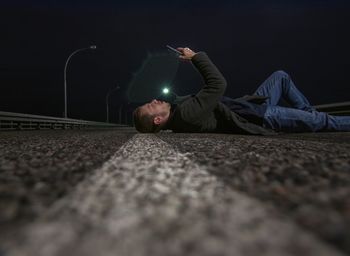 Surface level of man lying down