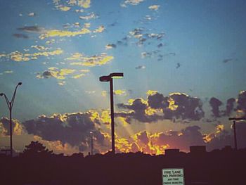 Low angle view of street light against sky at night