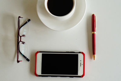 Directly above shot of coffee cup on table