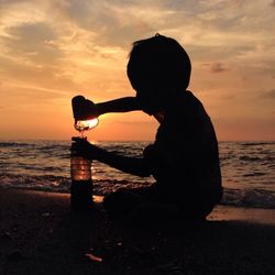 Scenic view of sunset over sea