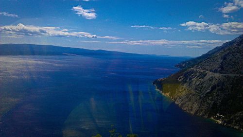 High angle view of bay against sky