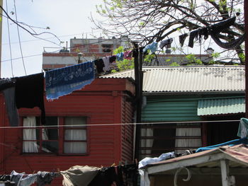 Houses against sky in city
