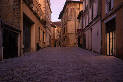 Narrow alley along buildings