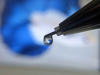 Close-up of bicycle against blurred background