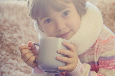 Close-up of woman drinking coffee