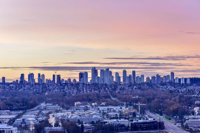 High angle view of buildings against sky during sunset