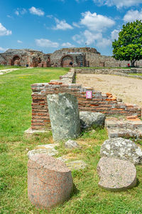 View of old ruins against cloudy sky