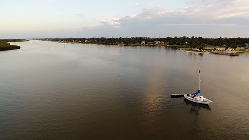 High angle view of nautical vessel on river against sky
