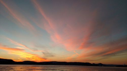 Scenic view of sea at sunset